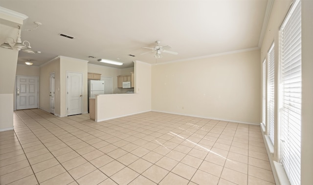 unfurnished living room featuring light tile patterned flooring, ornamental molding, and ceiling fan with notable chandelier