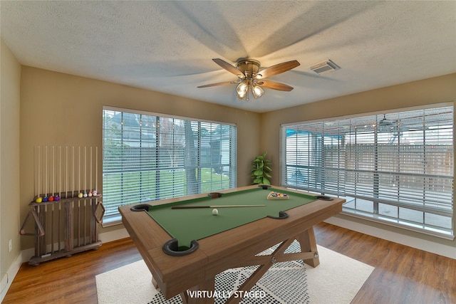 rec room featuring ceiling fan, wood-type flooring, billiards, and a wealth of natural light