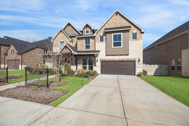 view of front of home featuring a garage and a front yard