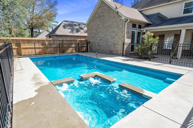 view of pool with a patio