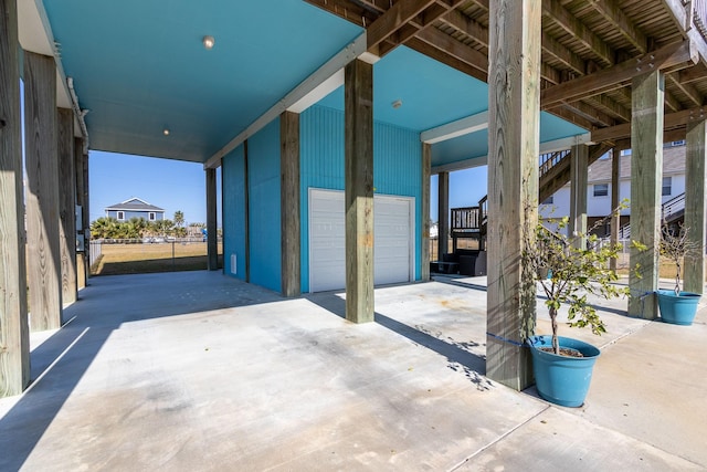 view of patio featuring a carport