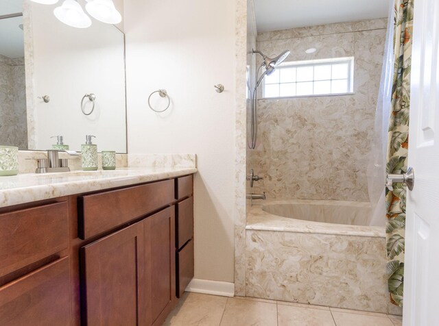 bathroom with vanity, tile patterned floors, and shower / bath combination with curtain