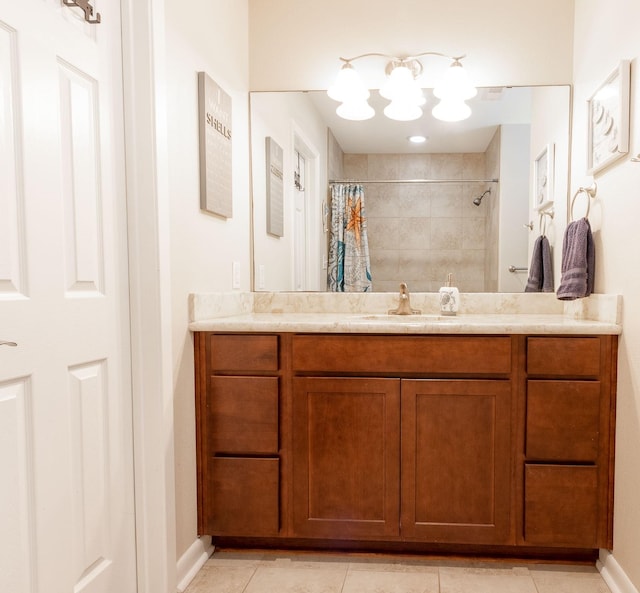 bathroom with tile patterned flooring, vanity, and a shower with shower curtain