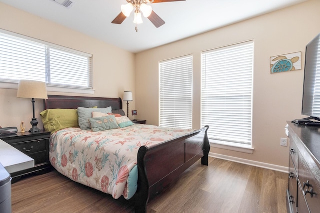 bedroom featuring hardwood / wood-style flooring and ceiling fan