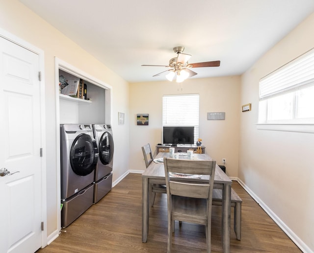 laundry area with dark wood-type flooring, ceiling fan, and washer and dryer