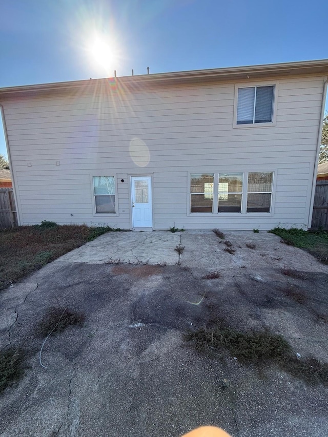 back of property with a patio area