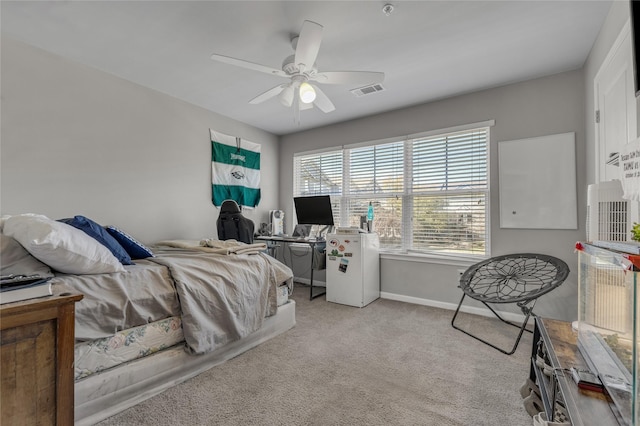 bedroom with light colored carpet and ceiling fan