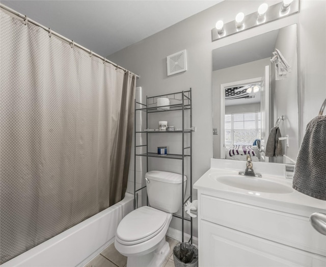 full bathroom with vanity, tile patterned flooring, toilet, and shower / tub combo with curtain