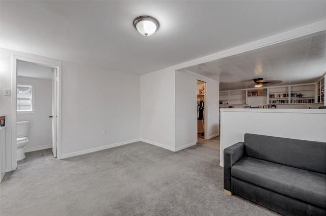 living area with light colored carpet