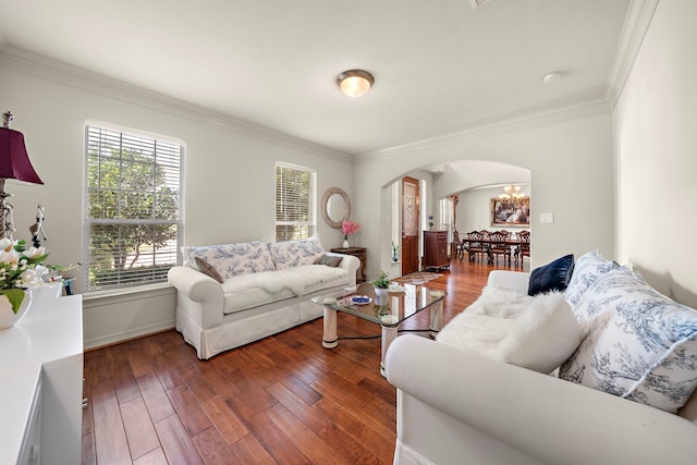 living room with crown molding and dark hardwood / wood-style flooring