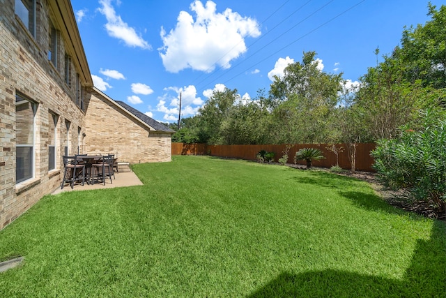 view of yard with a patio area