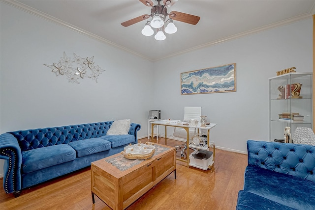 living room featuring crown molding, ceiling fan, and wood-type flooring