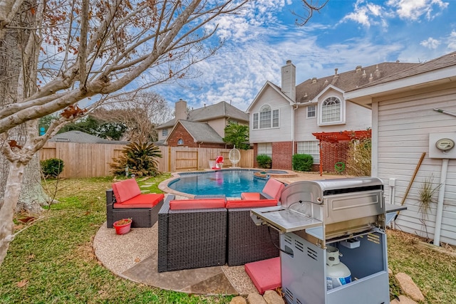 view of pool featuring an outdoor hot tub