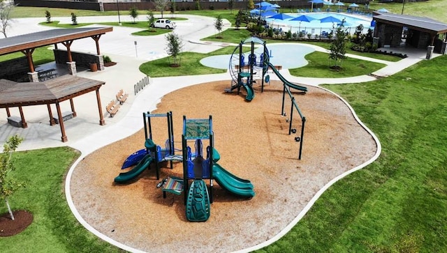 view of home's community with a gazebo, a yard, and a playground