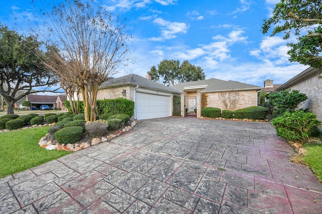 single story home featuring a garage