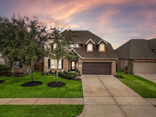 view of front of home with a yard