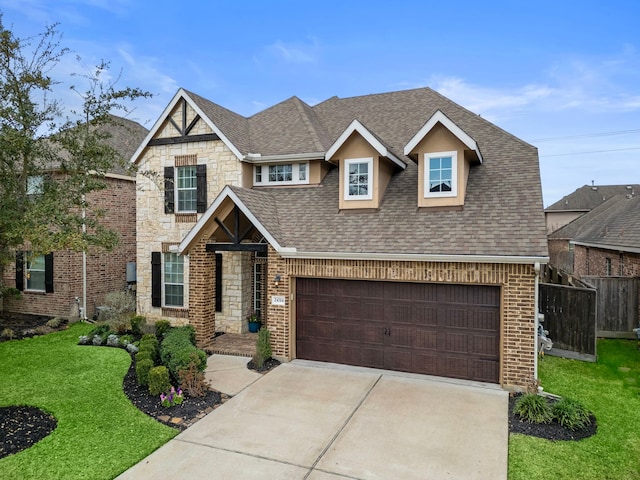 view of front facade featuring a garage and a front yard