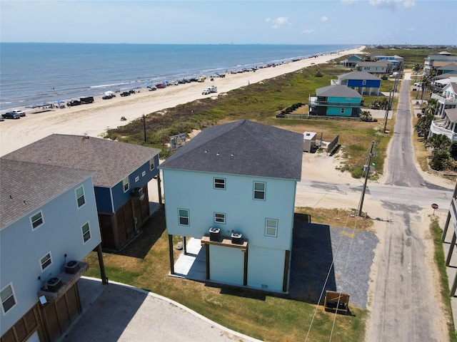 drone / aerial view with a view of the beach and a water view