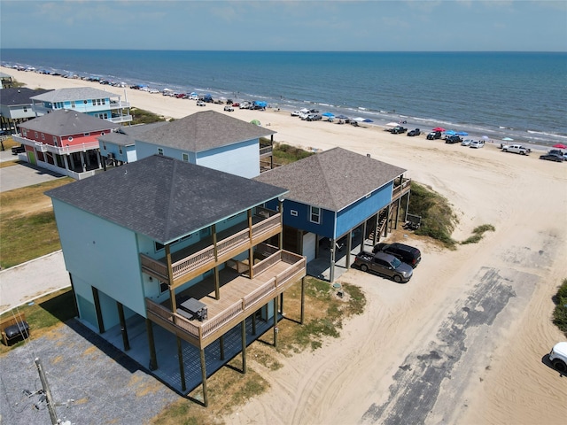 bird's eye view with a view of the beach and a water view