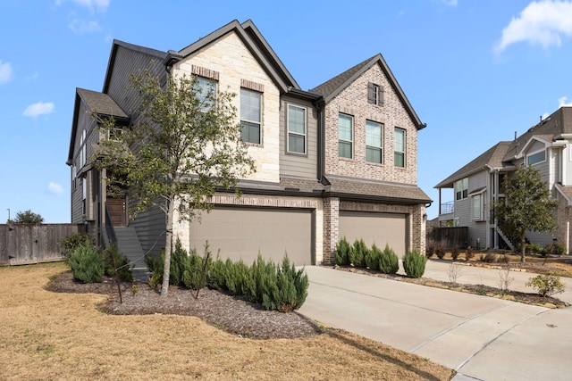 view of front of property with a garage and a front yard