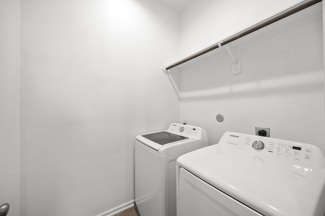 washroom with washer and clothes dryer