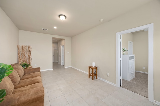 living room featuring light tile patterned flooring