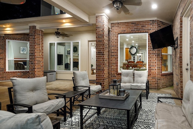 view of patio with outdoor lounge area and ceiling fan