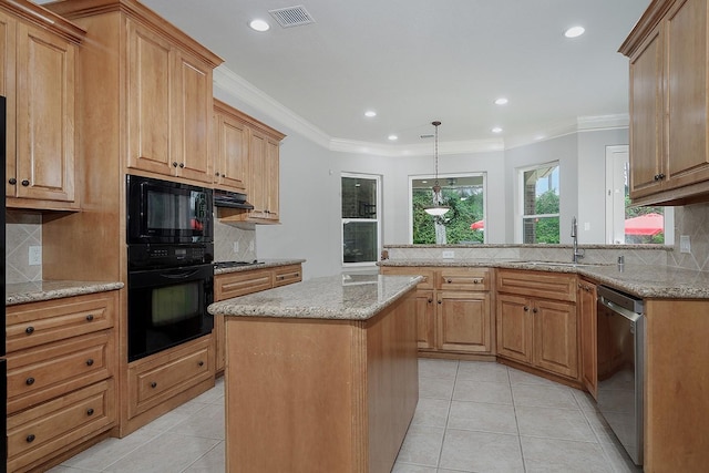 kitchen featuring light tile patterned floors, crown molding, hanging light fixtures, a center island, and black appliances