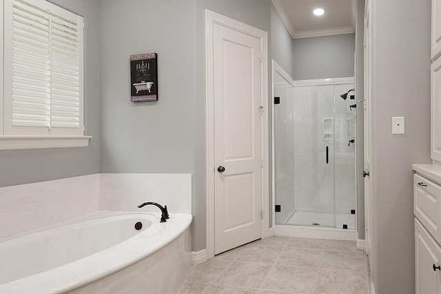 bathroom featuring crown molding, shower with separate bathtub, and tile patterned flooring