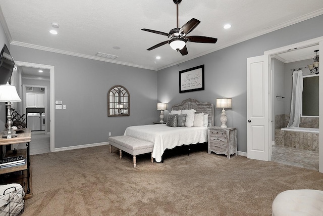 bedroom featuring separate washer and dryer, ornamental molding, and carpet