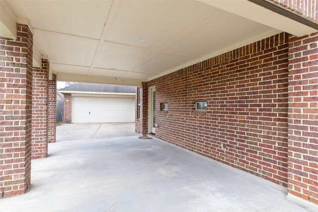 view of patio with a garage