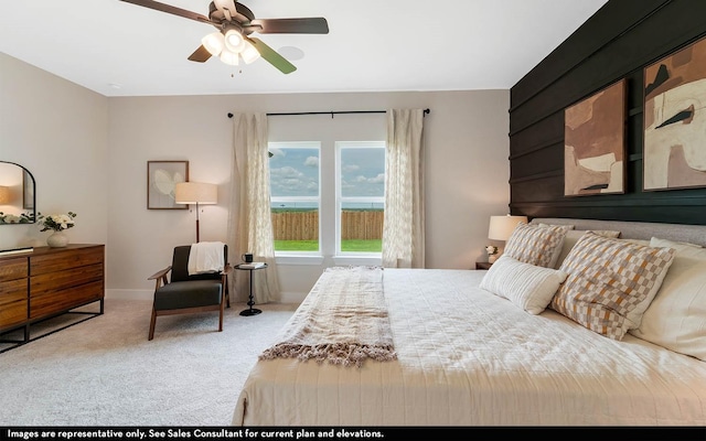 bedroom featuring light colored carpet