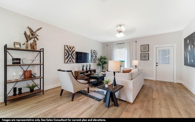 living room with light hardwood / wood-style flooring