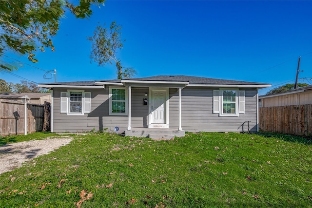 single story home with a front yard