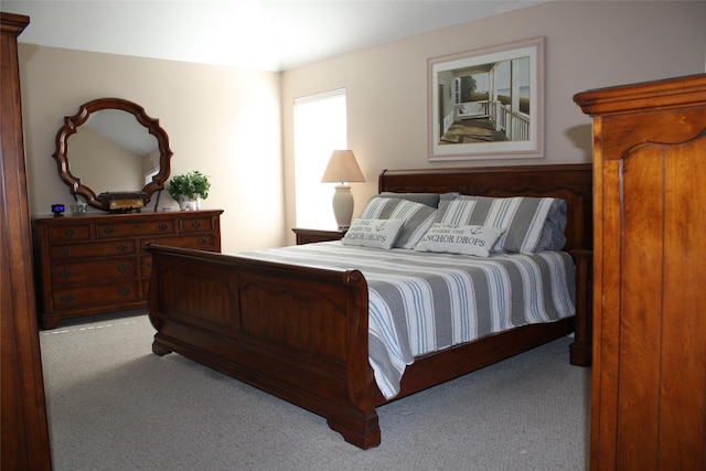 bedroom with light carpet