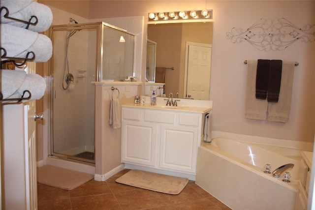 bathroom with vanity, separate shower and tub, and tile patterned flooring