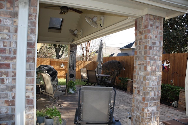 view of patio with a gazebo and ceiling fan