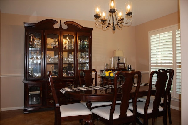 dining space with a notable chandelier