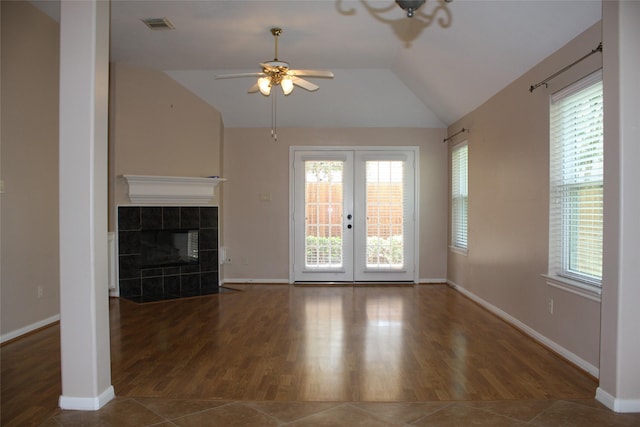 3011 Candle Bend Dr, Spring, TX 77388 - unfurnished living room featuring wood finished floors, baseboards, visible vents, a ceiling fan, and lofted ceiling