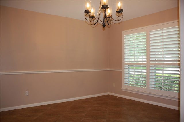 3011 Candle Bend Dr, Spring, TX 77388 - empty room featuring baseboards and an inviting chandelier