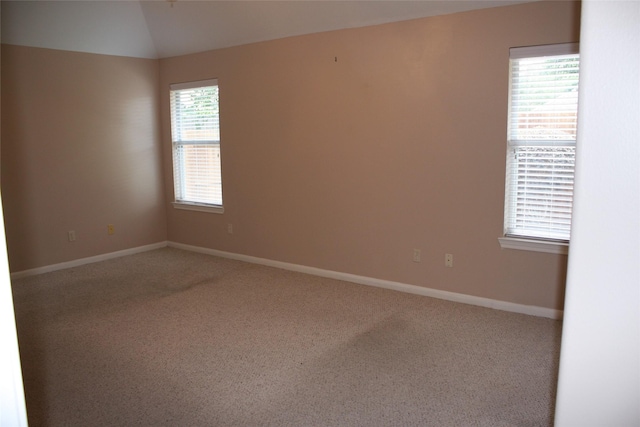 3011 Candle Bend Dr, Spring, TX 77388 - spare room with lofted ceiling, carpet, and baseboards
