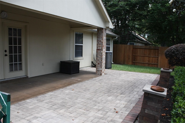 3011 Candle Bend Dr, Spring, TX 77388 - view of patio with central AC unit and fence