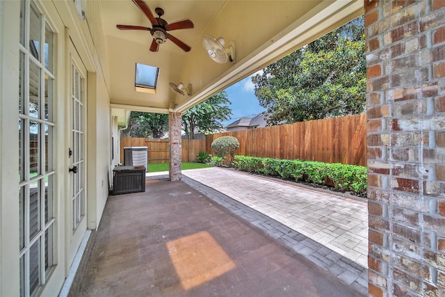 3011 Candle Bend Dr, Spring, TX 77388 - fenced backyard with a patio and a ceiling fan