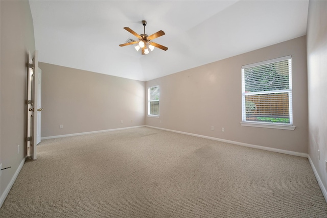 3011 Candle Bend Dr, Spring, TX 77388 - spare room featuring a ceiling fan, light colored carpet, and vaulted ceiling
