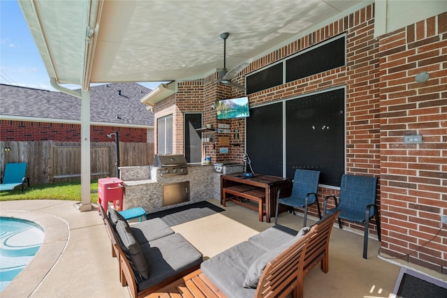 view of patio with a grill and exterior kitchen