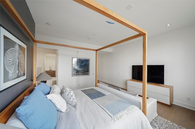 bedroom featuring light wood-type flooring