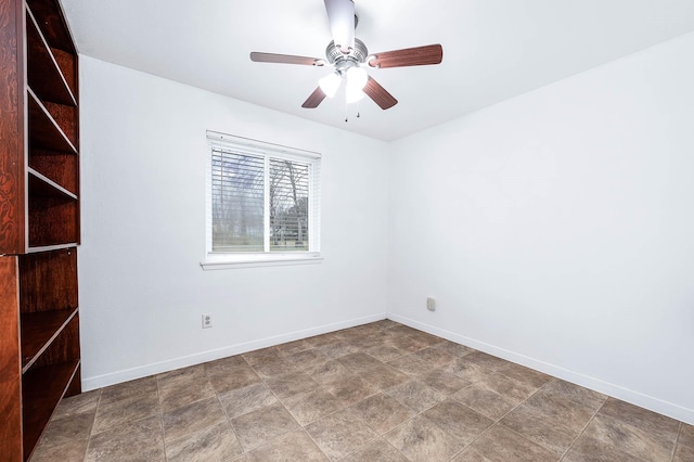 spare room featuring ceiling fan