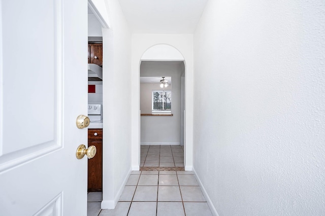 hallway with light tile patterned floors