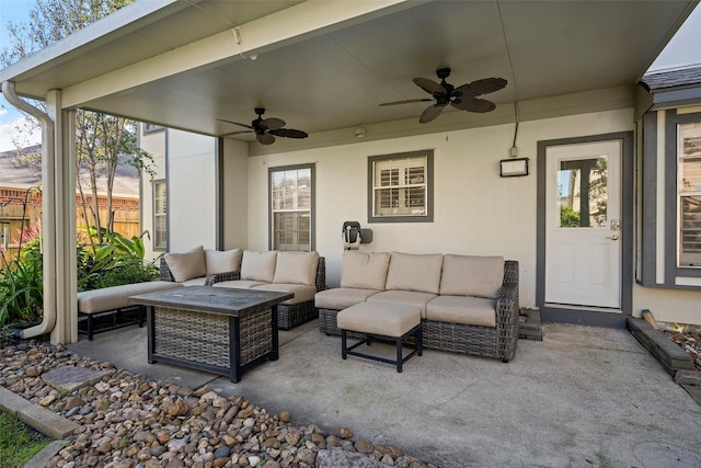 view of patio featuring an outdoor living space and ceiling fan