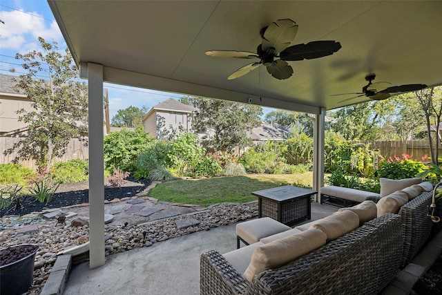 view of patio featuring an outdoor living space and ceiling fan